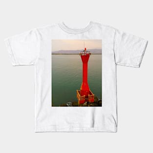 Old red lighthouse in right frame Kids T-Shirt